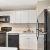 Renovated Kitchen  with black appliances