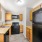 Classic style kitchen with black appliances