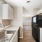 Renovated Kitchen  with black appliances
