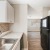 Renovated Kitchen  with black appliances