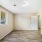 Bedroom with a ceiling light facing the door