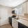 Renovated Kitchen  with black appliances