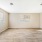 Huge Living room with windows on each wall
