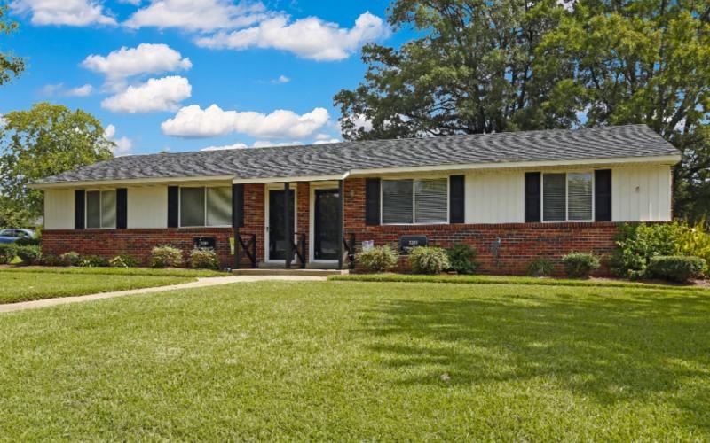 a house with a lawn in front