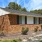 a house with a brick driveway